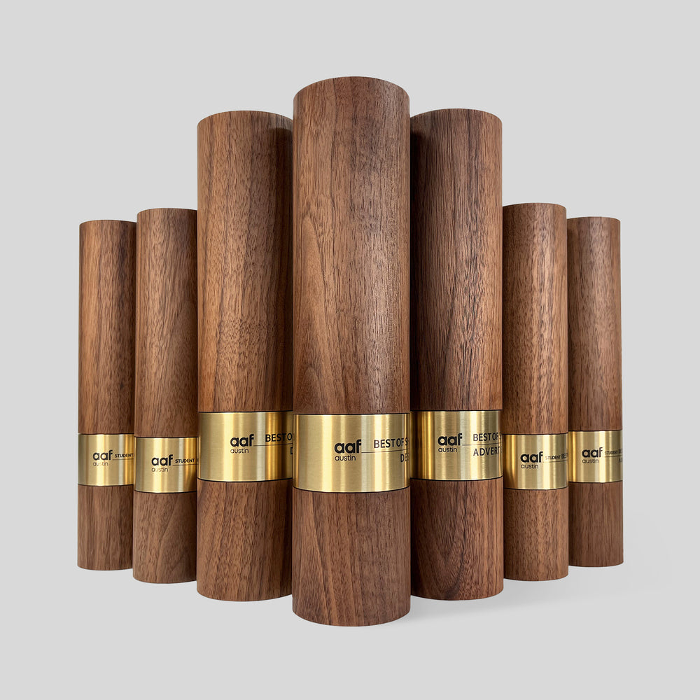 Stela Round Award | Large features wooden round trophies with gold bands, symbolizing unity and prestige, crafted for honoring significant achievements with elegance and sophistication. Unique, modern, architect-designed and artisan-crafted in USA. 