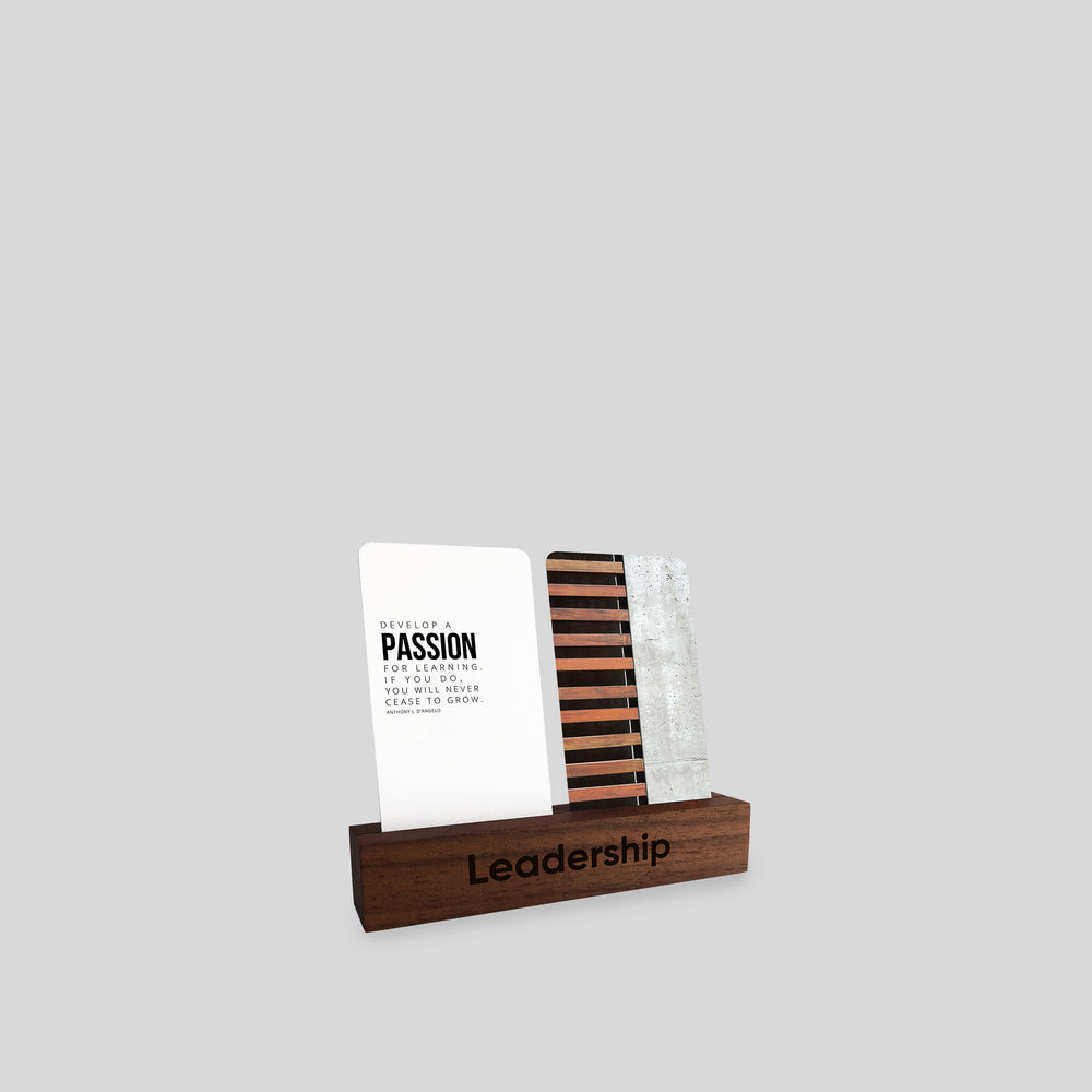 Inspirational Desk Card Collection featuring a wooden holder with art and quote cards, ideal for enhancing remote workspaces with daily inspiration.