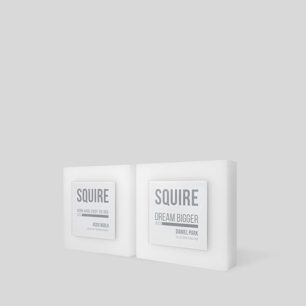 Glacio Award Square features a layered, frosted-white acrylic trophy design with a substantial base and geometric plate, embodying balance and elegance, ideal for honoring achievements for annual employee awards and team recognition.