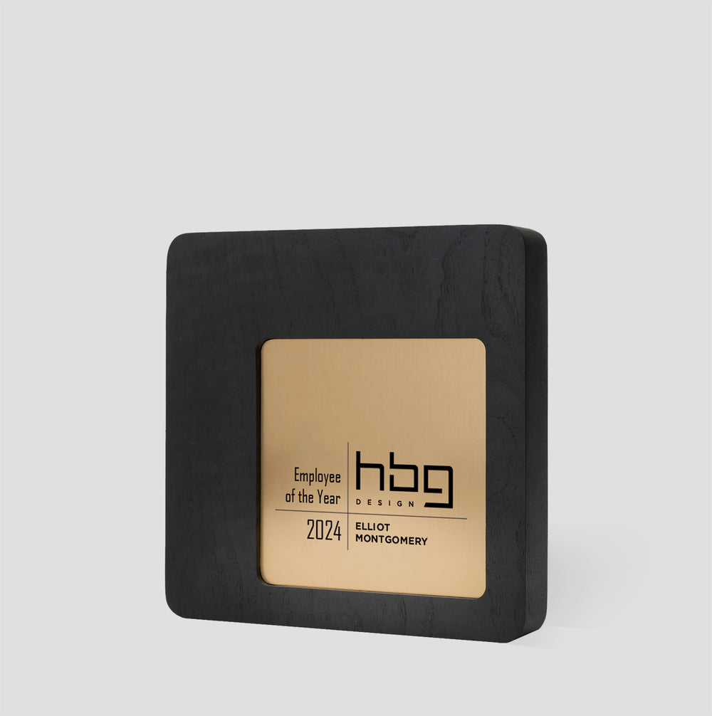Figura Quadrato Plaque: a square award plaque with rounded corners and an offset nameplate, blending modern sophistication with timeless elegance for distinctive recognition, wood with metal mixed-media, engraved.
