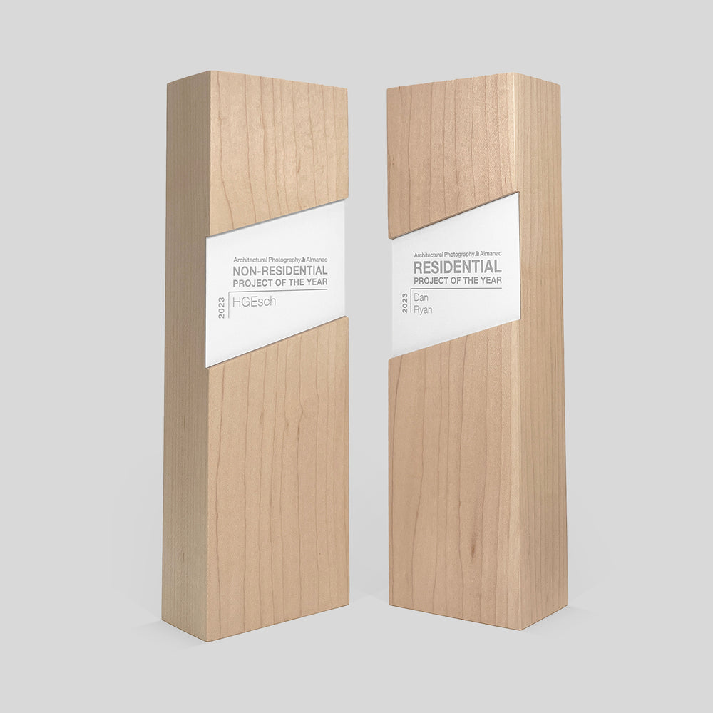 Figura Rectangulum Award featuring wooden and metal nameplate, symbolizing strength and balance, expertly crafted with walnut, personalized for honoring impactful leadership.