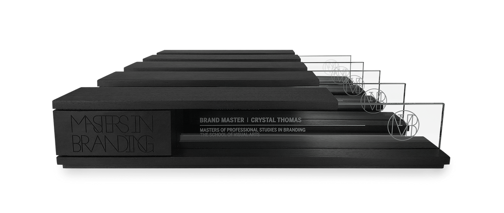 A group of five unique and elegant recognition awards crafted from wood and glass that are engraved and personalized.