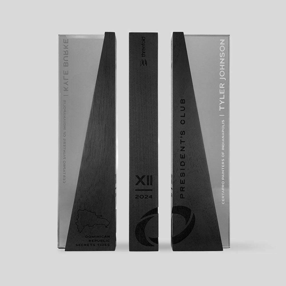 Unique President&#39;s Club trophies custom-designed by Trophyology for Threefold. Trophy design is shown from front, side, back and features laser-engraving. 