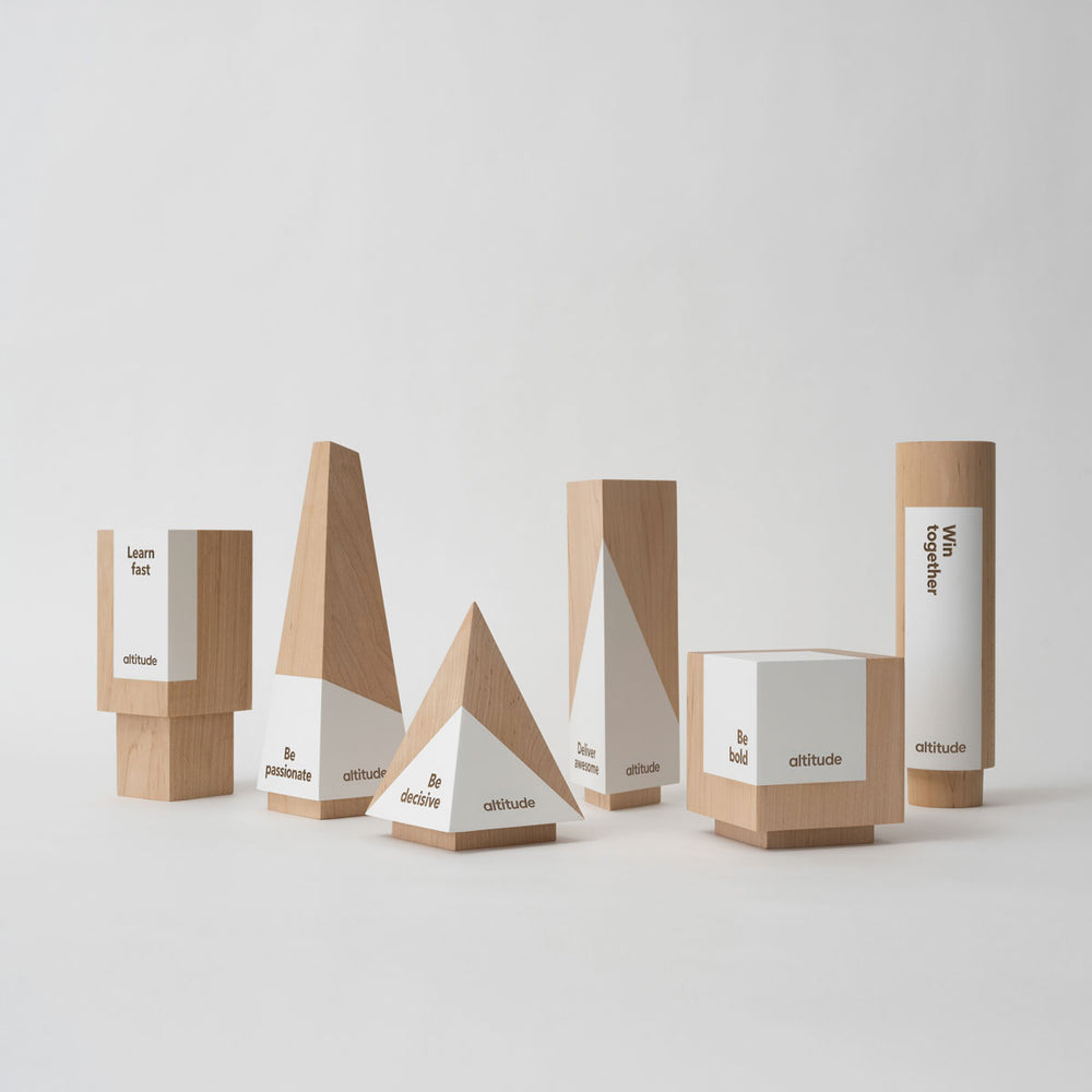 Modern recognition awards for employees and clients crafted from wood and laser-engraved