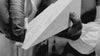 Trophyology artisan staining wood triangle-trophy in Austin Texas Studio