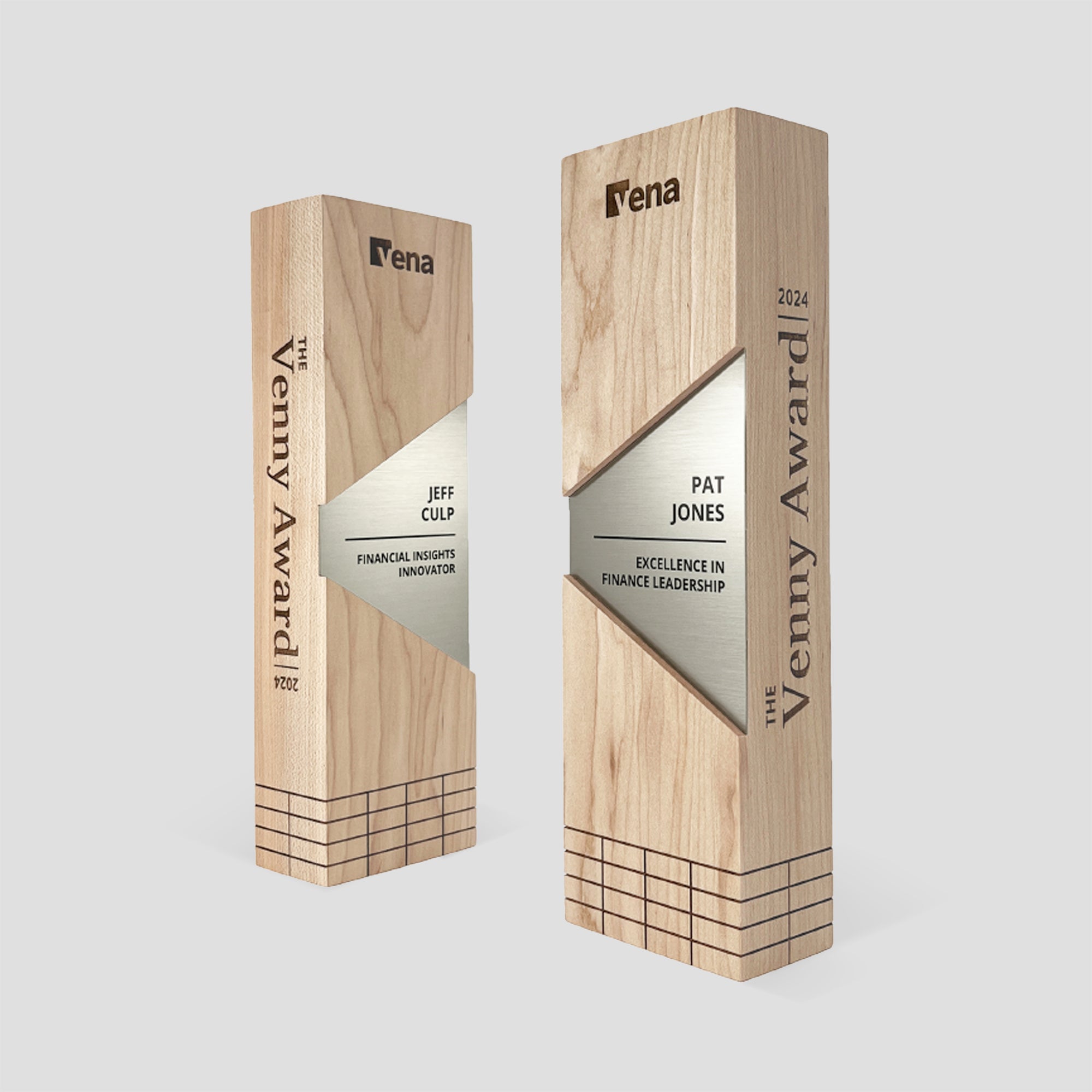 Figura Trapezium Award, a wooden trapezoidal award plaque in a rectangular trophy with black engraving, personalized as unique custom company award.