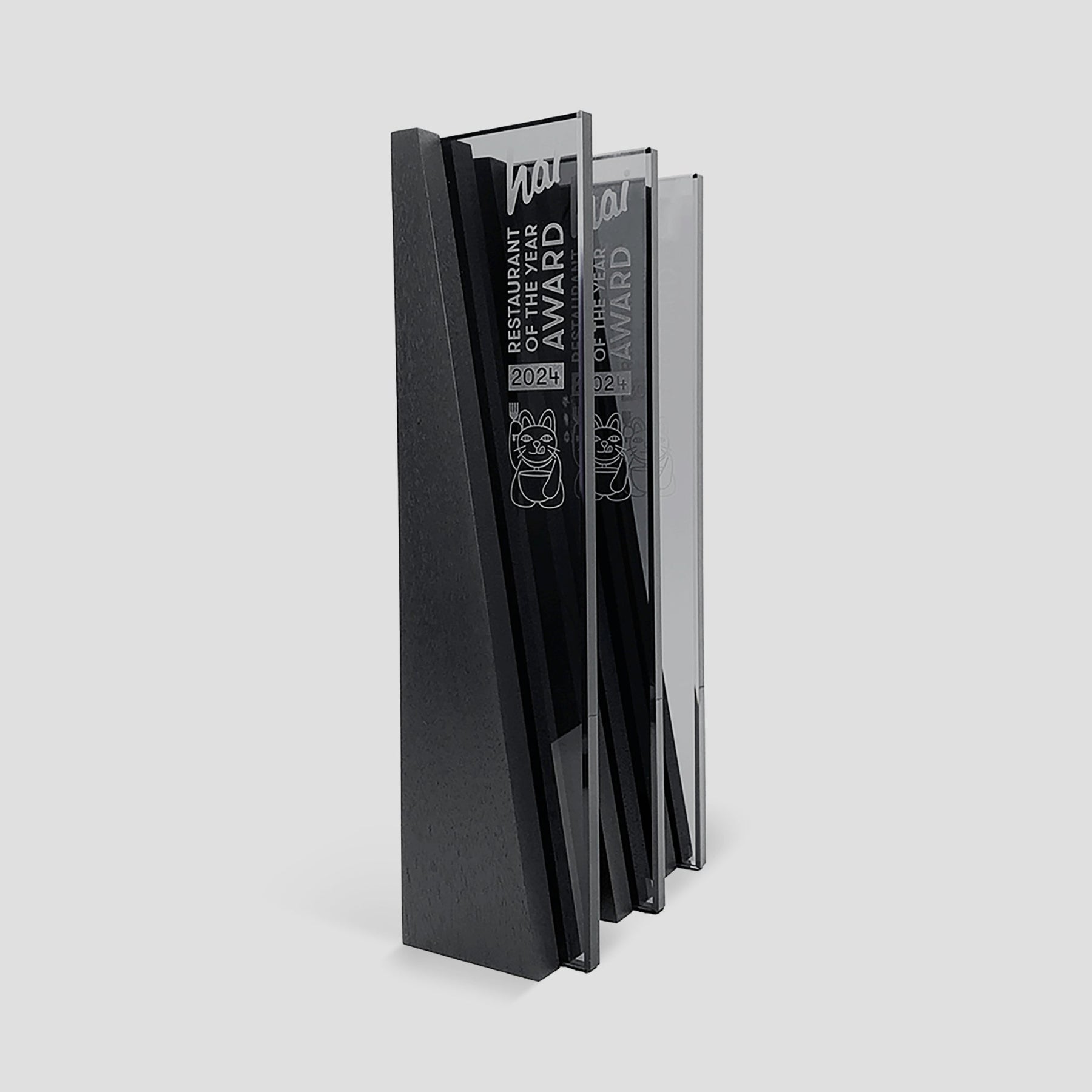 DI/MI Awards are modern and unique wood and glass trophies, featuring dynamic interlocking wood and glass parts, personalized as corporate trophies.